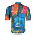Maglia da ciclismo arancione Artist – Manica corta, vestibilità aderente, stampa colorata | Nomad Vélo