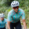 Maglia da ciclismo Pro verde arancione – Manica corta, vestibilità slim, Neon Ember | Nomad Vélo