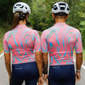 Maglia da ciclismo Pink Pro – Manica corta, vestibilità slim, fantasia Neon Ember | Nomad Vélo