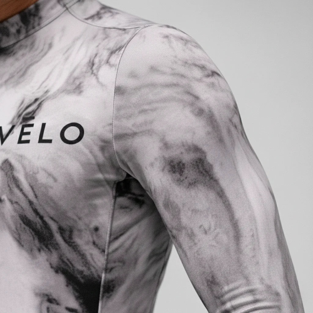 Maglia da ciclismo a maniche lunghe Obsidian – Aero Fit termica nera dal design elegante per l'inverno | Nomad Vélo